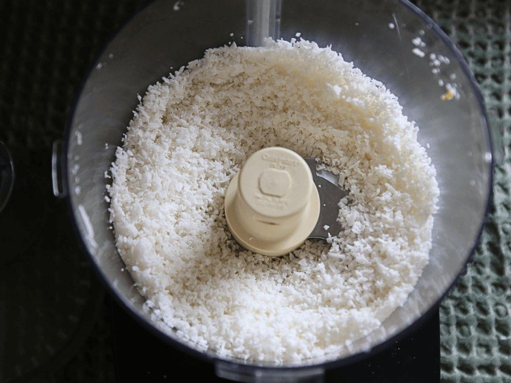 Unsweetened coconut flakes that have been shredded by food processor