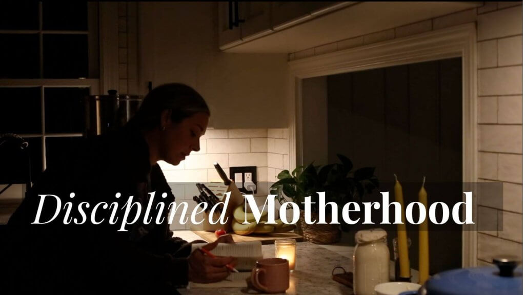 Disciplined motherhood. Woman reading by candlelight