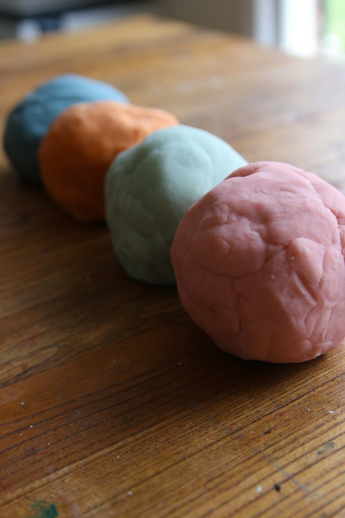 homemade nontoxic playdough with real food dye on the table
