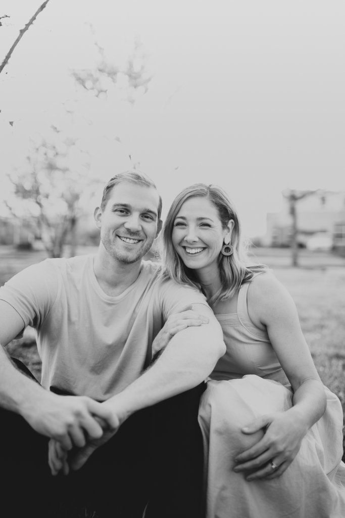 man and woman smiling together