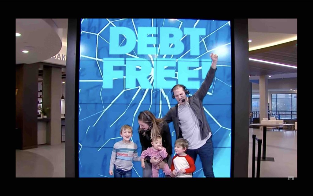 family doing the debt free scream