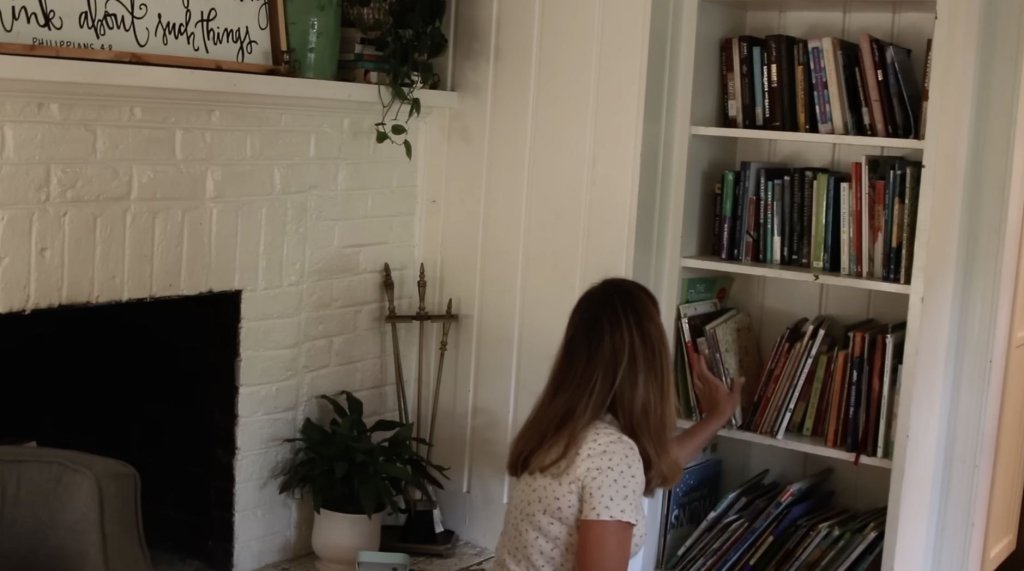 woman organizing books