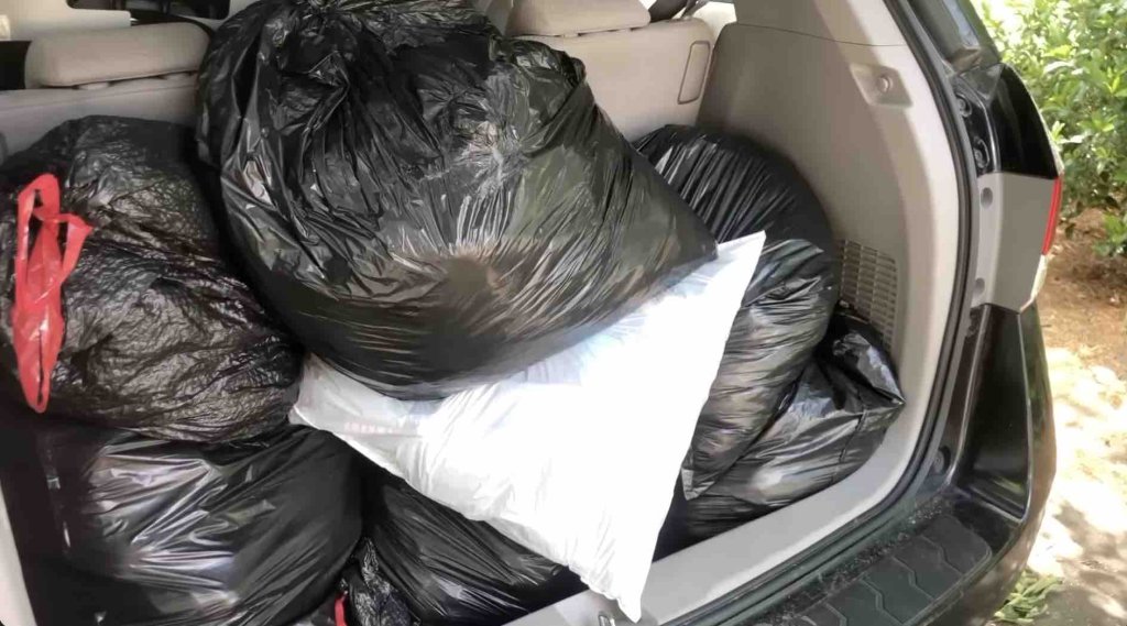 trash bags in a car