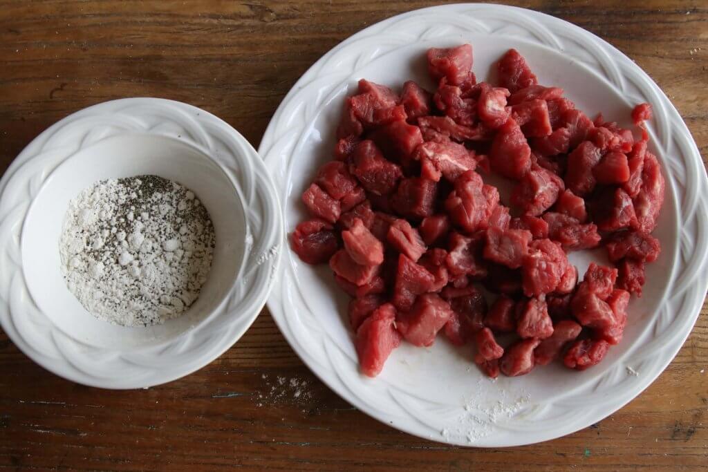beef pieces, with flour and pepper to mix