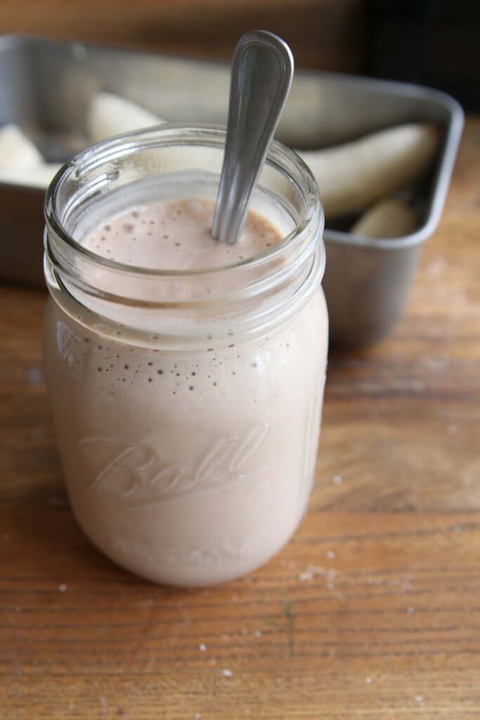 glass cup with chocolate smoothie