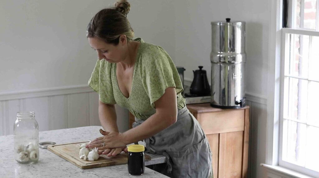 Lana working on dinner